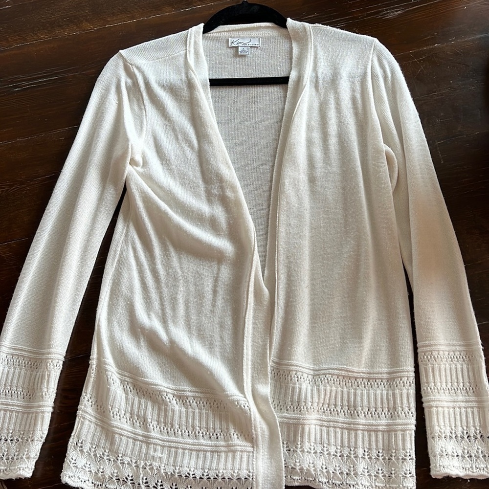 Cream cardigan with detail on bottom